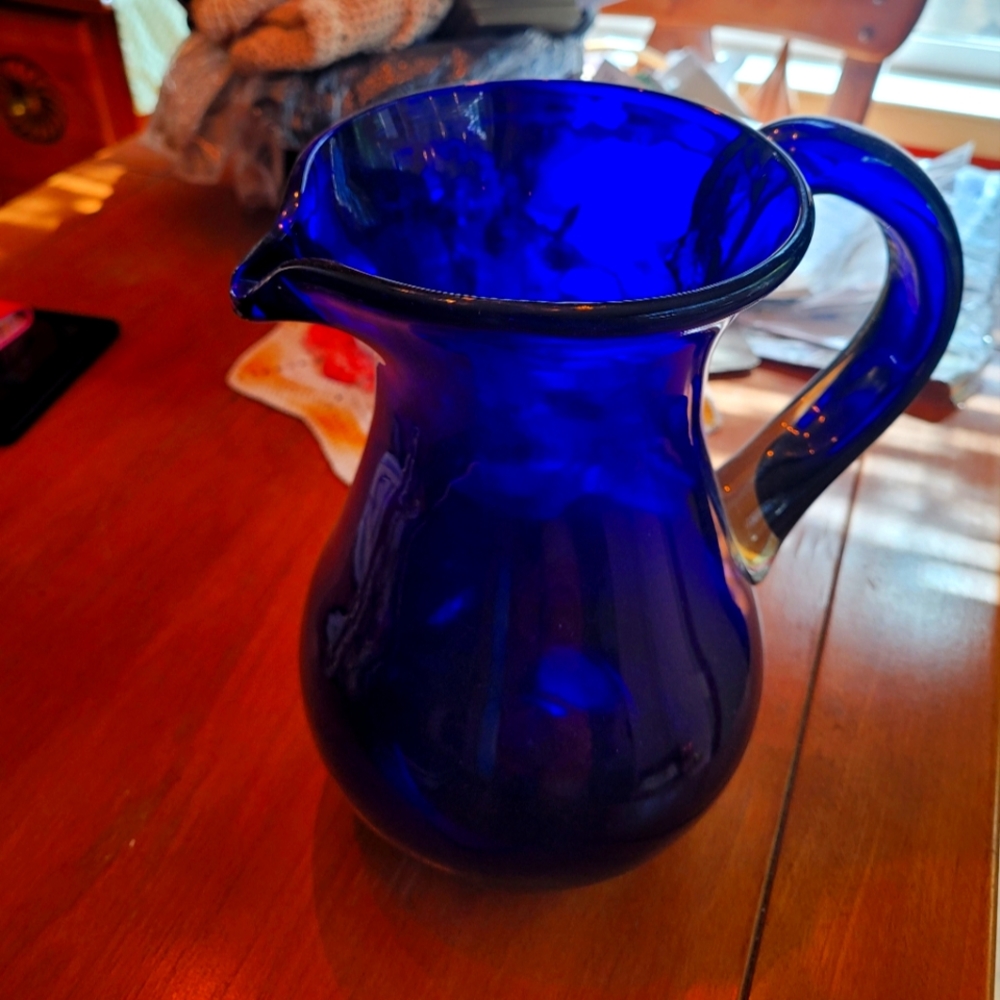 Glass pitcher. Vintage made in Mexico. 9 inches tall.